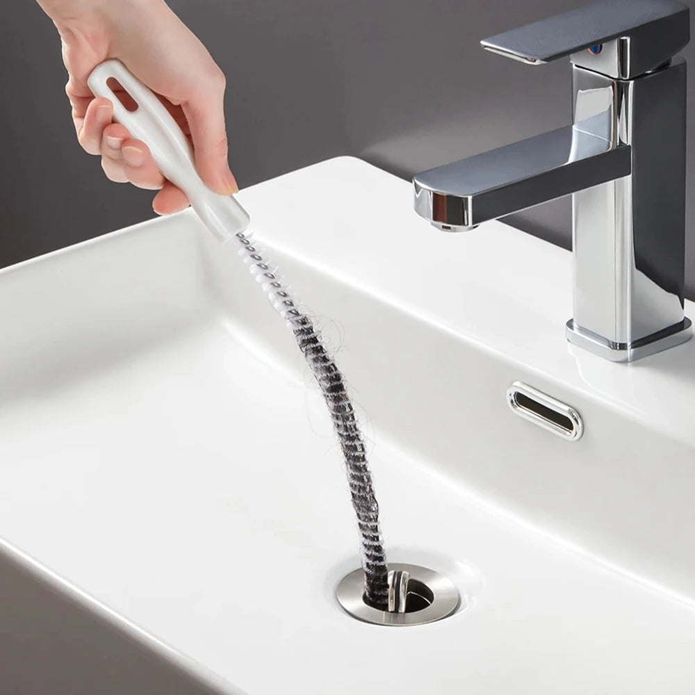 Cepillo Desatascador Flexible: Elimina Pelos y Obstrucciones al Instante.